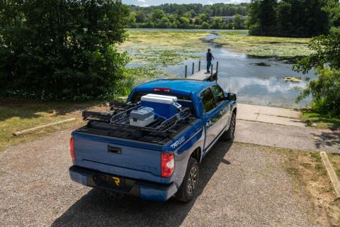 RetraxOne XR Retractable Tonneau Cover Matte One Piece Polycarbonate Construction 2022-2026 Toyota Tundra CrewMax 5' 7 inch Bed with Deck Rail System without Stake Pockets without Trail Special Edition Storage Boxes