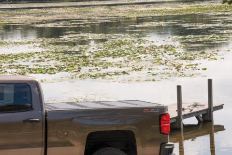 BAKFlip FiberMax Hard Folding Truck Bed Cover Rail Mounts Near Top of Bed Rail Rails Can Be Lowered Using Drop Down Brackets 2022-2026 Toyota Tundra 6 Foot 7 Inch Bed with or without Deck Rail System w/out Trail Special Edition Storage Boxes BAK