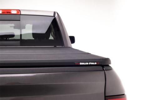 Solid Fold 2.0 Tonneau Cover Black Textured Paint 2012-2018 (2019-2024 Classic) Ram 1500/2012-2024 2500/3500 6' 4 inch Bed with RamBox Extang