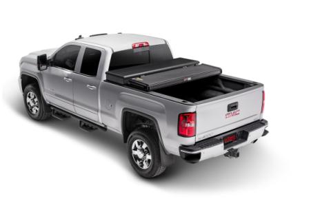 Solid Fold 2.0 Tool Box Tonneau Cover Black Textured Paint For Use w/Existing Tool Box Tool Box Not Included 2007-2013 Silverado/Sierra 1500/2007-2014 2500 HD/3500 HD 6' 6 inch Bed without Cargo Management System Extang