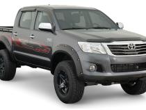 Black Pocket/Rivet Style Smooth Finish 4-Piece Fender Flare Set For 2011-2013 Toyota Hilux Bushwacker