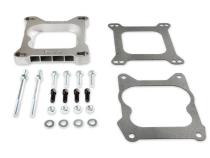Carb Adapter Open Center Adapts 4-barrel Square Flange carburetors to spreadbore intake manifolds Mr Gasket