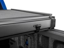 Solid Fold ALX Tonneau Cover Black Textured Paint 2016-2024 Nissan Titan XD 6' 6 inch Bed with Utili-Track System Extang